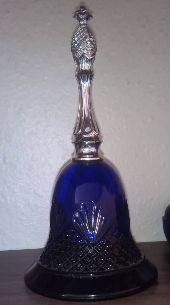 Beautiful vintage 1970's Avon perfume bottle in the shape of a bell