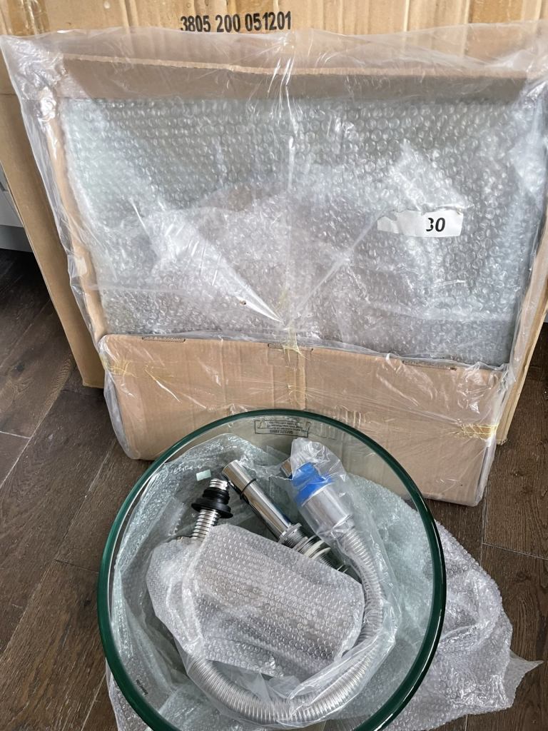 Glass basin and pedestal towel rail 