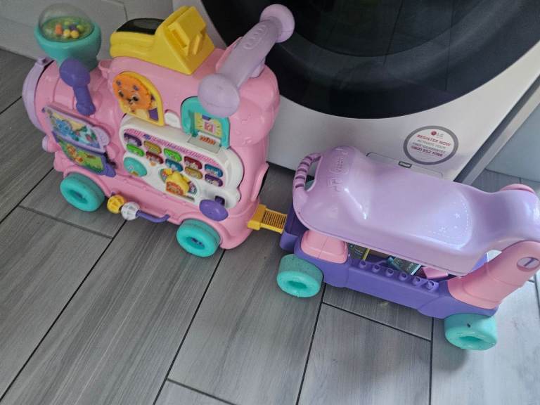 Pink & Purple Kids Musical Ride-On Train Toy – Good Condition