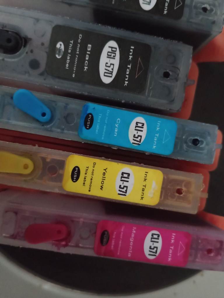 Cannon 5750  refillable ink cartridges number 570 571