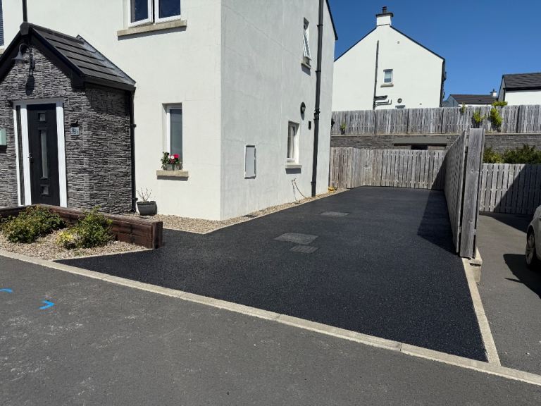 Tar sealing and power washing 