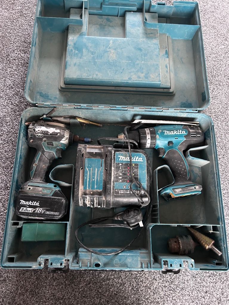 Makita impact driver, combo drill, charger and 1 x 5Amp battery