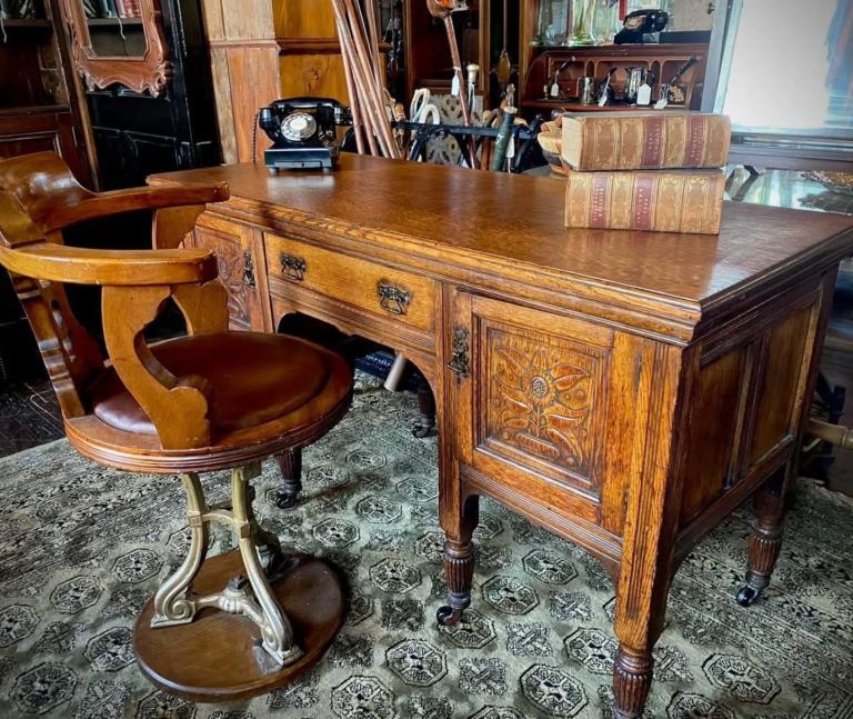 Victorian Oak Kneehole Pedestal Desk on Original Castors. Presented in Lovely Condition
