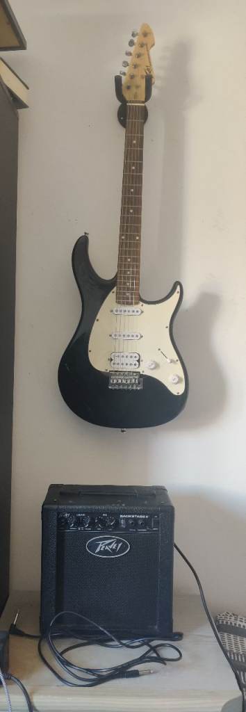 Peavey Raptor Plus EXP Electric Guitar & Peavey Backstage II Amp