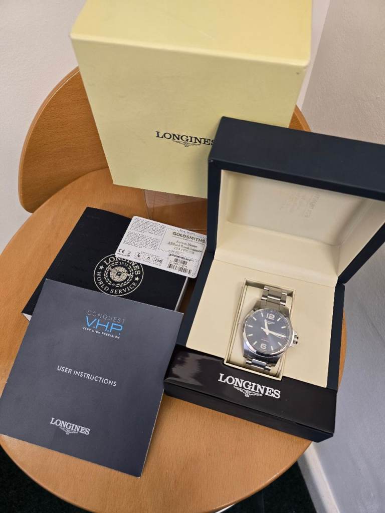 LONGINES CONQUEST V.H.P QUARTZ CALENDAR WATCH L3.716.4