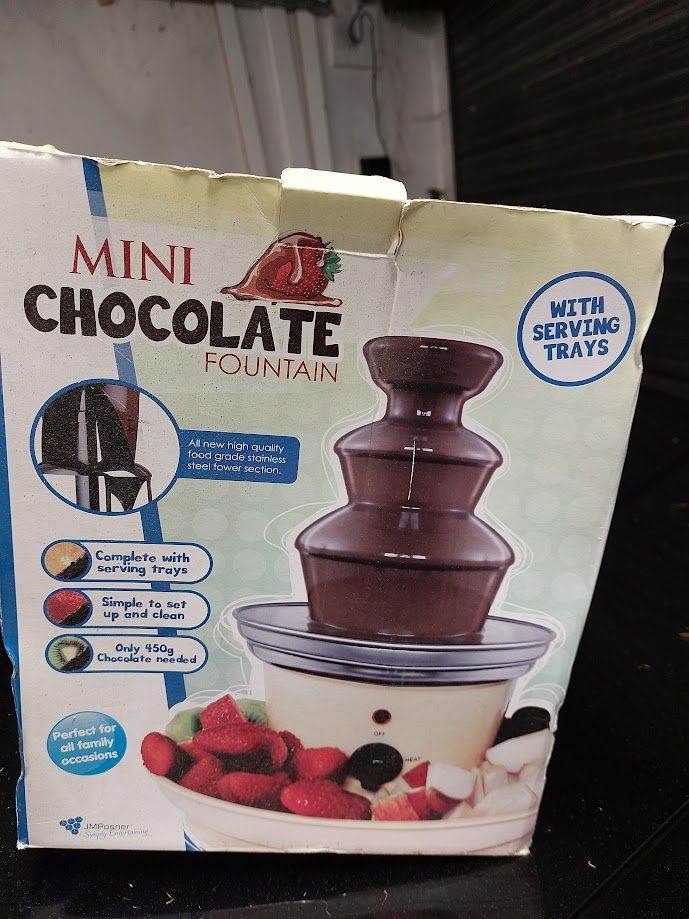 A chocolate fountain easy to use fun for parties easy to clean