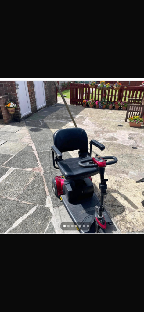 Pride Mobility Go-Go Elite Traveller Plus, 3-wheel version.