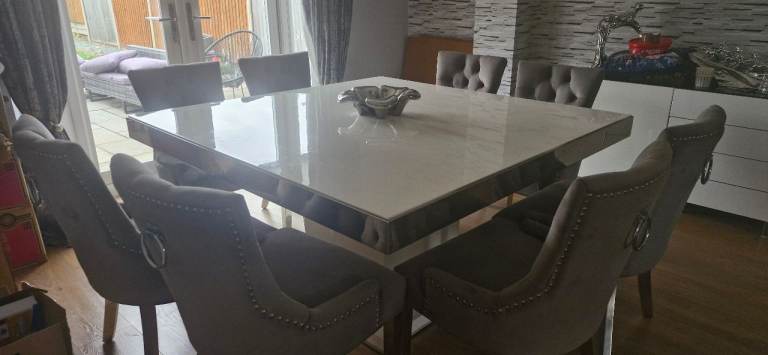 Modern White Dining Table with 8 Grey Upholstered Chairs