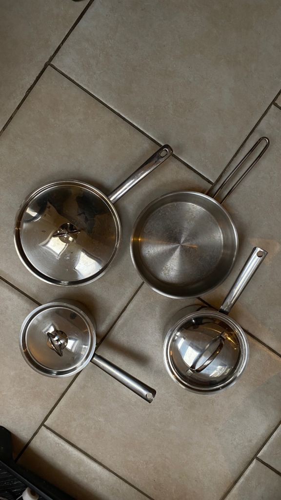 4 Stainless Steel Pots and Pans Set with 3 Lids – Good Condition