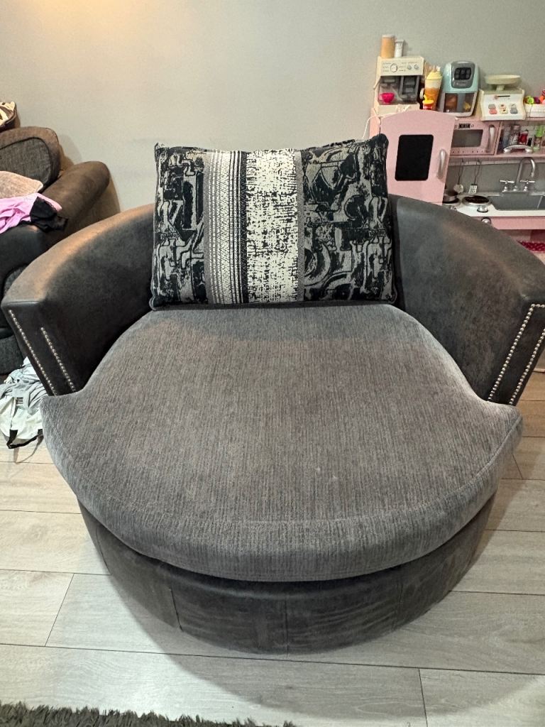 Grey Swivel Armchair with Cushion – Fair Condition