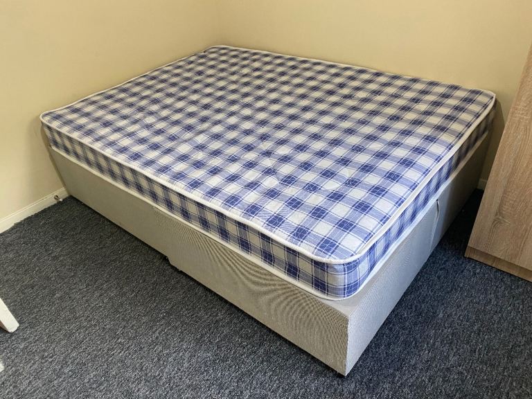 Double bed base and mattress - new.