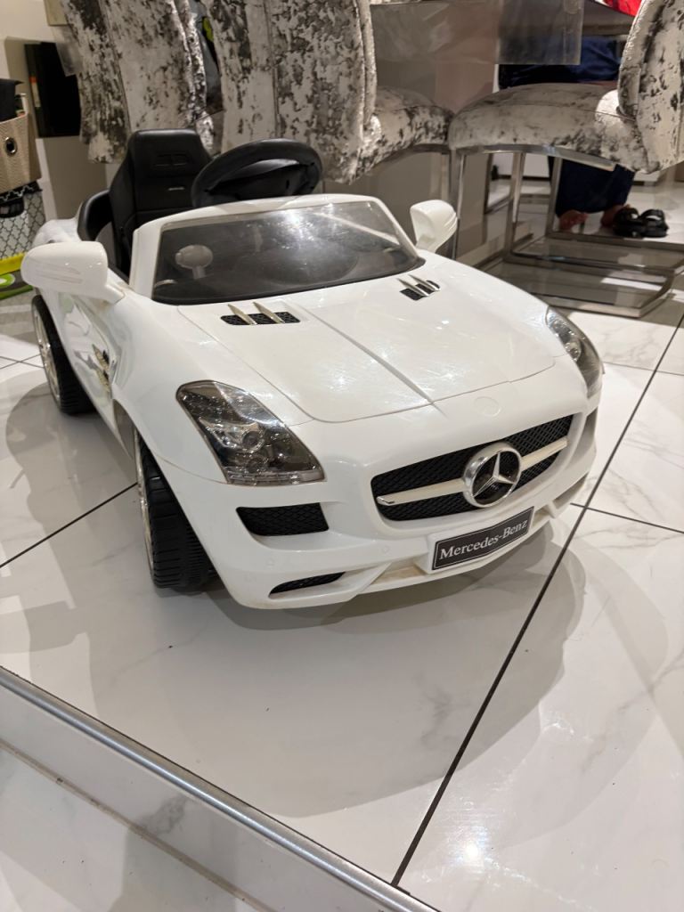White Mercedes-Benz SLS Kids Electric Ride-On Car – Good Condition