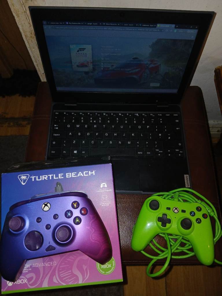 Lenovo laptop and x2 xbox controllers 