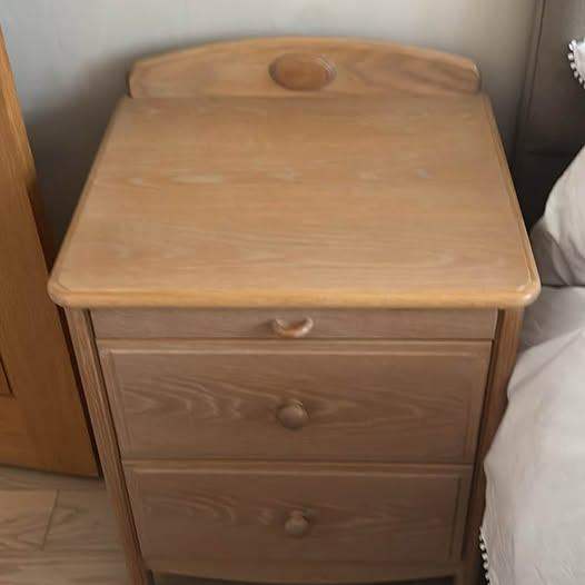 Stag limed oak bedside cabinet with pull out tray and drawers good quality and condition.