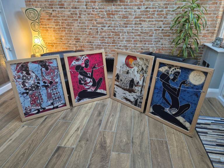 Four batik pictures on wooden frames