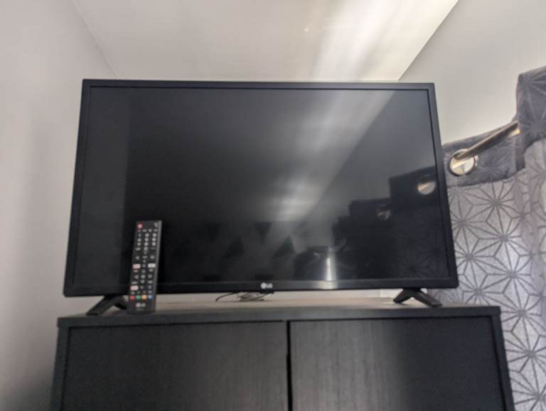 LG 32-inch Black TV with Remote Control