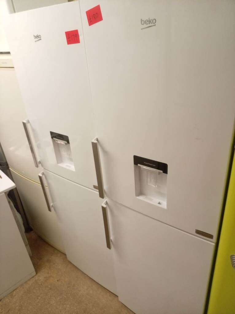  Beko 6ft tall fridge freezer with water dispenser work perfect £90