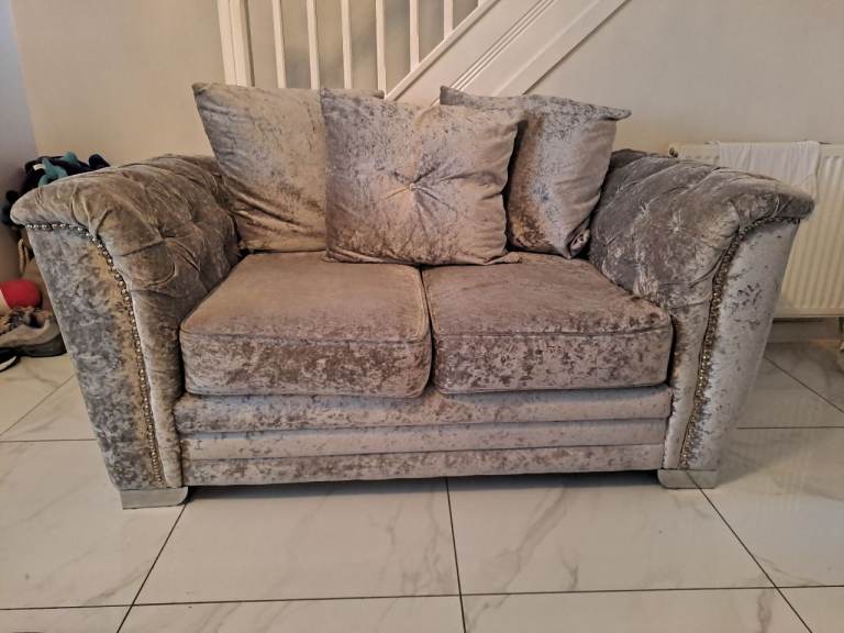 Grey crushed velevt sofas 