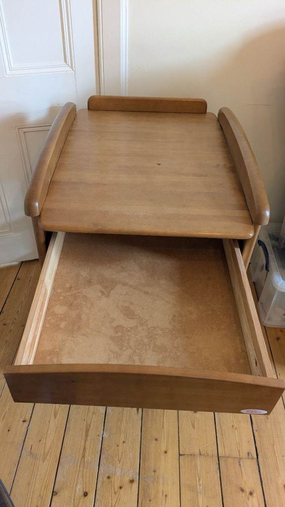 Changing table with drawer