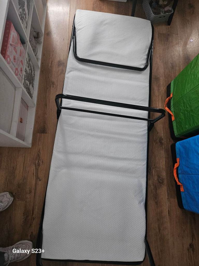 Folding guest beds x2
