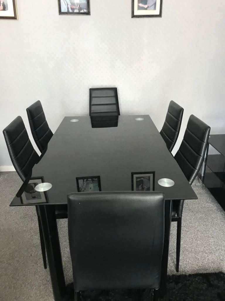 Black glass top dineing set 6 chairs