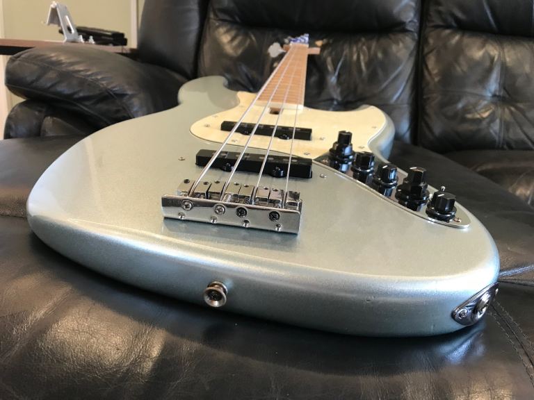 Marcus Miller V7 Alder-4 string bass guitar-  2nd Gen, silver, plays great! Great value 