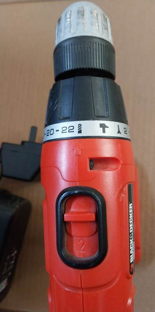 Cordless Black and Decker drill with case