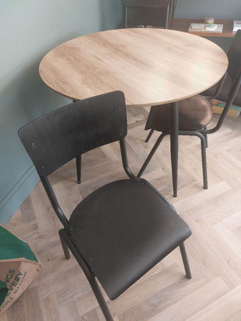 Dining table and black chairs for sale (used)