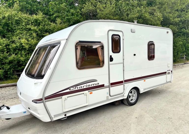 2005 swift charisma 4 berth fixed bed caravan with motor movers 