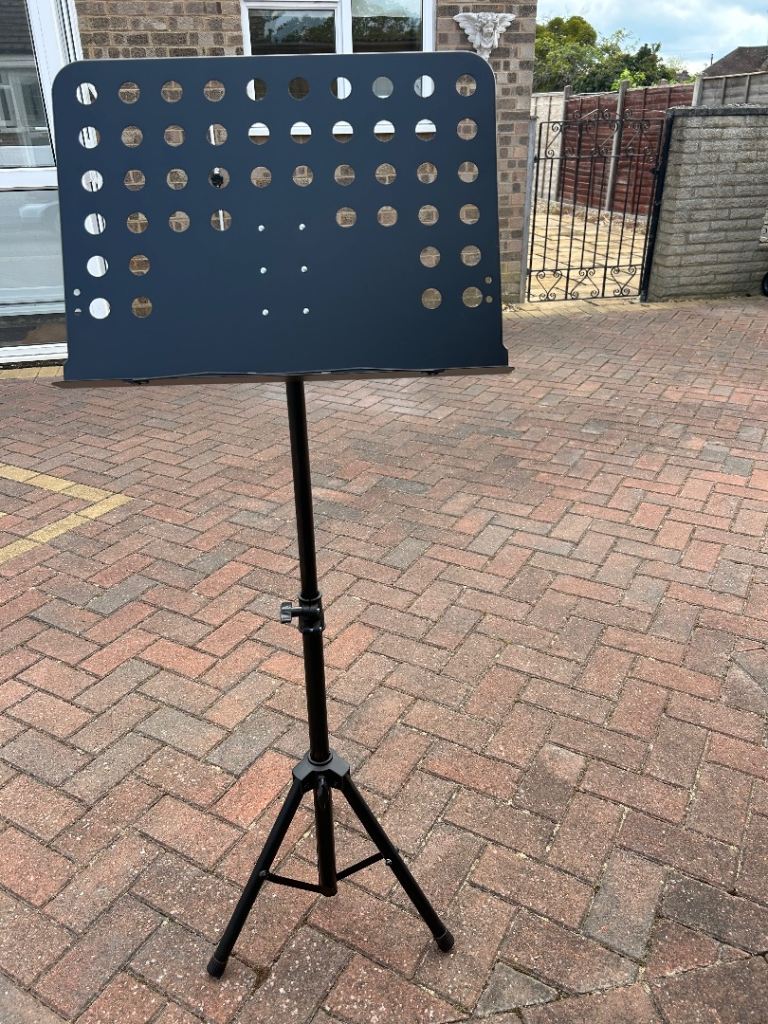 Brand new music stand .
