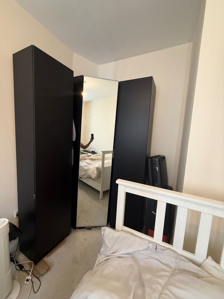 Black Wardrobe with Mirror Door – Good Condition