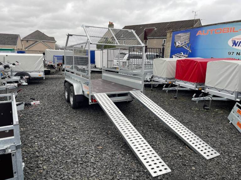 BRAND NEW 10FT X 5FT TWIN AXLE MASTER HEAVY DUTY TRAILER WITH 80CM MESH AND RAMPS 2700KG BRAKED