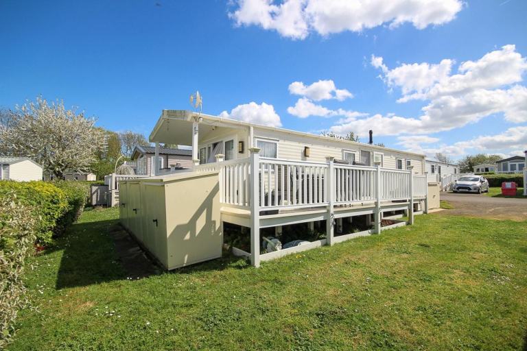 Willerby Avonmore 2019 static caravan sited at Allhallows, Kent. Decking