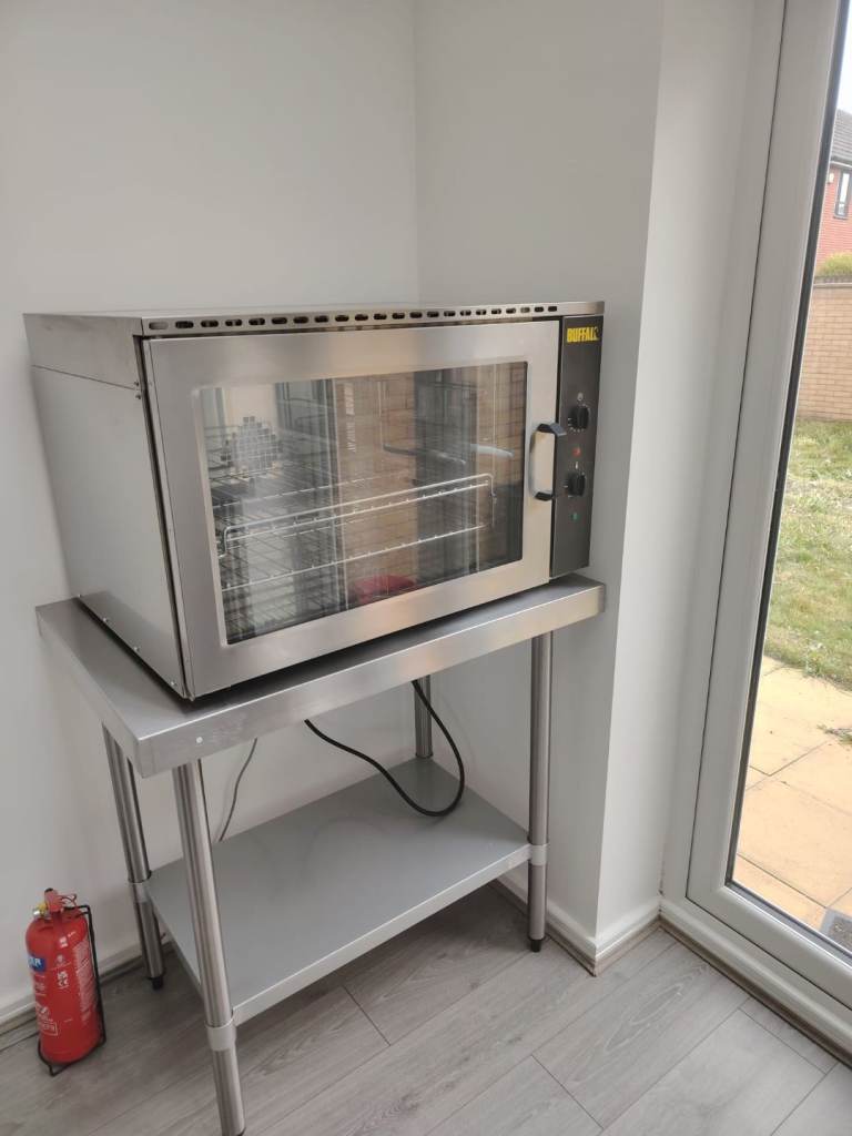 Convection Oven and stainless steel tables