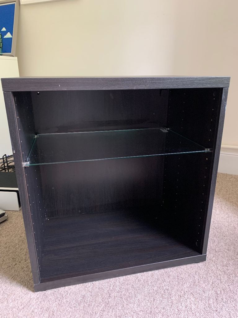 Small IKEA BESTA black storage unit with glass shelf