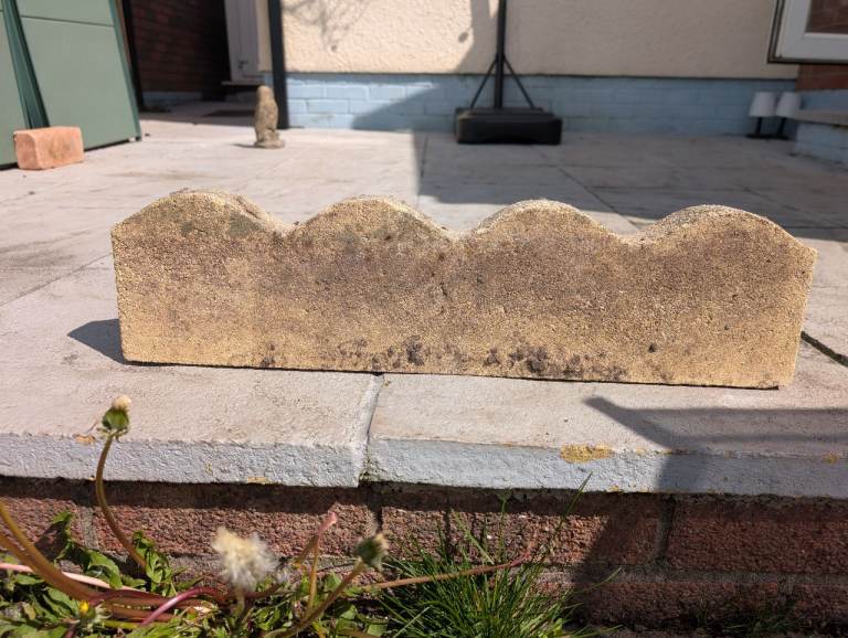 Reclaimed scalloped edging stones