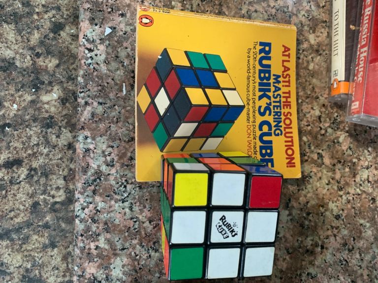 image for Two vintage Rubix cubes with cheat books