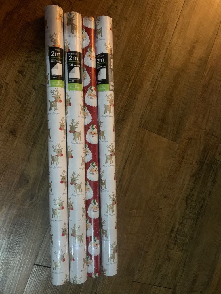 4 brand new Xmas wrapping paper roll