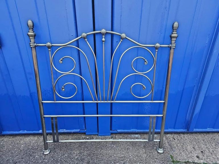 Double chrome headboard