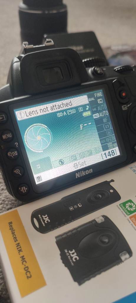 Nikon D3100 camera body/lens/remote/ screen protector/additional attachments