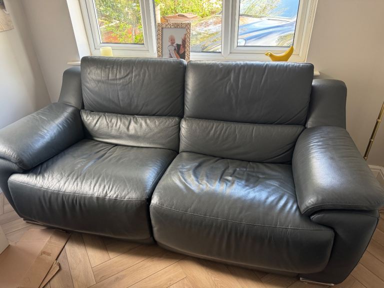 Grey leather reclining sofa