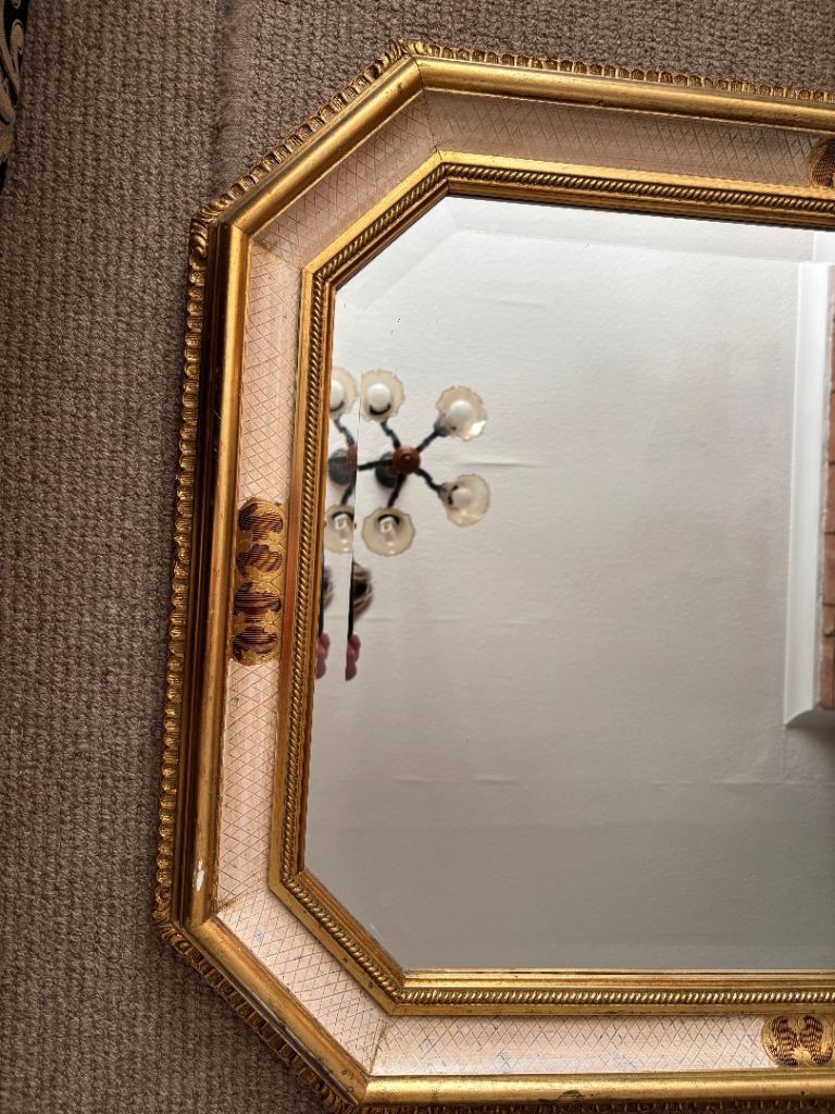 Ornate bevelled mirror