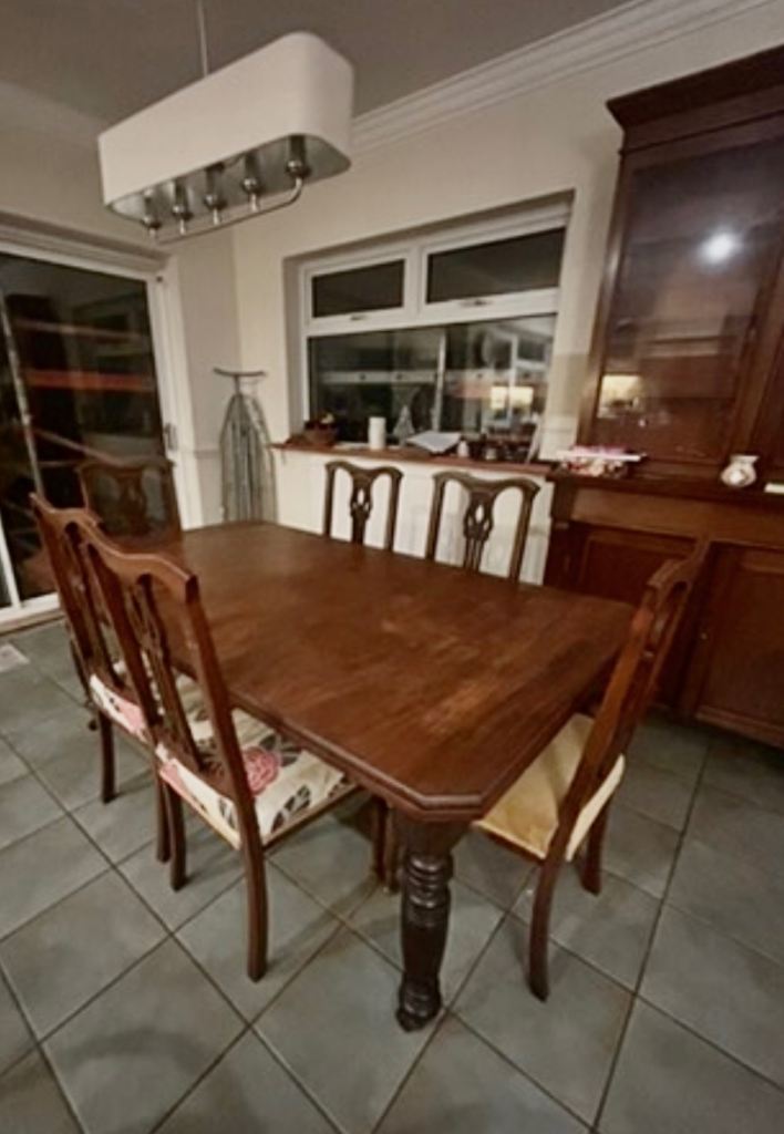 Antique solid wood table and 7 chairs 