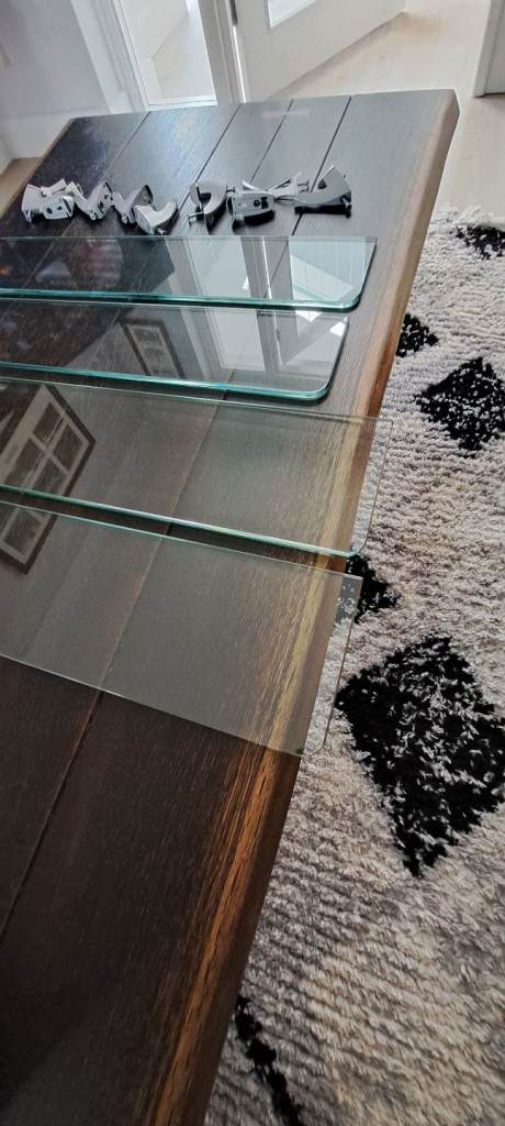 Glass bathroom shelving.