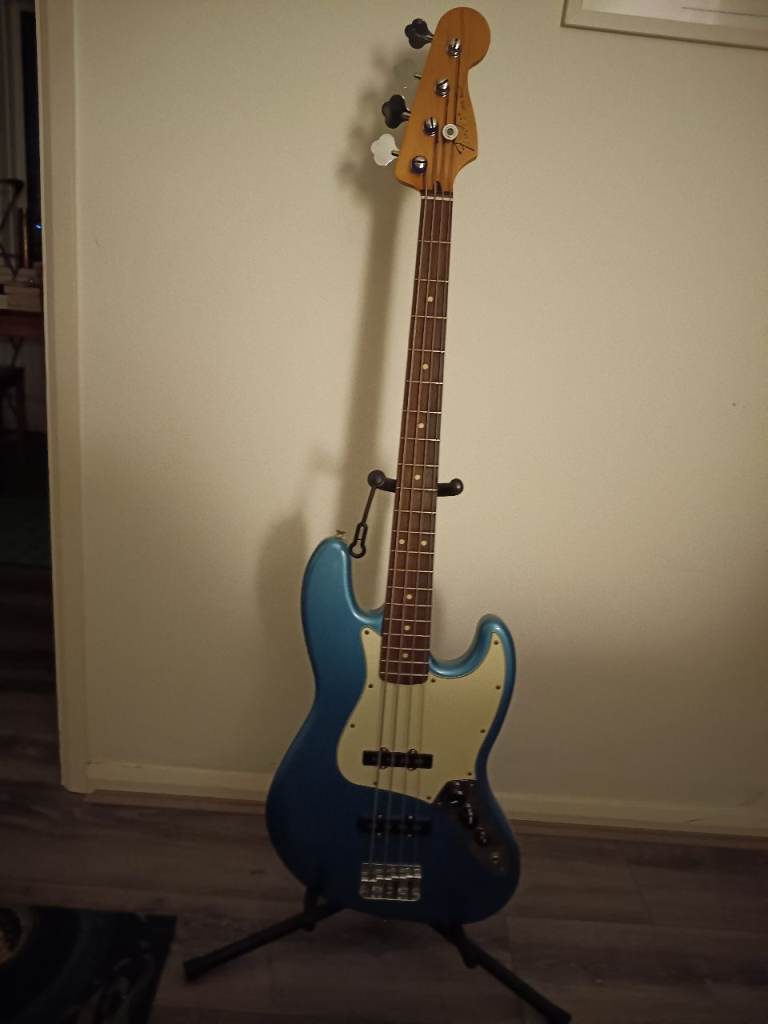 Fender Jazz bass in Lake Placid blue with Fender hard case, pickup upgrade