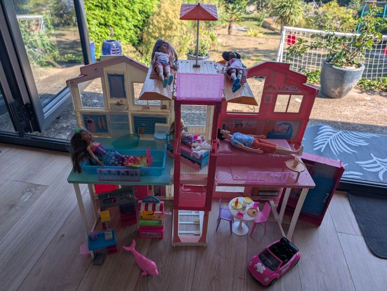 Barbie Dream house and dolls