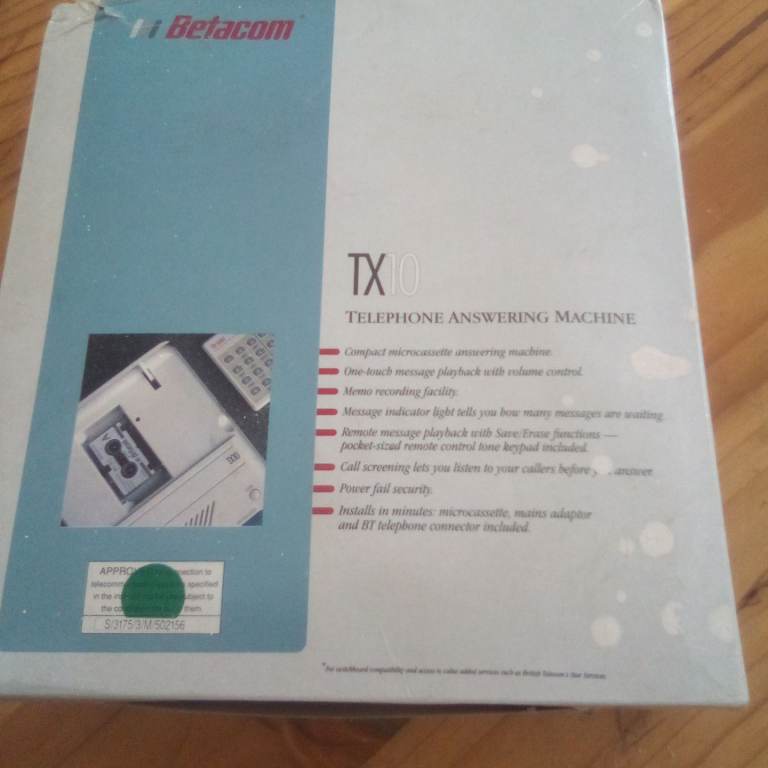 Betacom telephone answering machine hardly used, in box. Call screening remote access to mes. etc