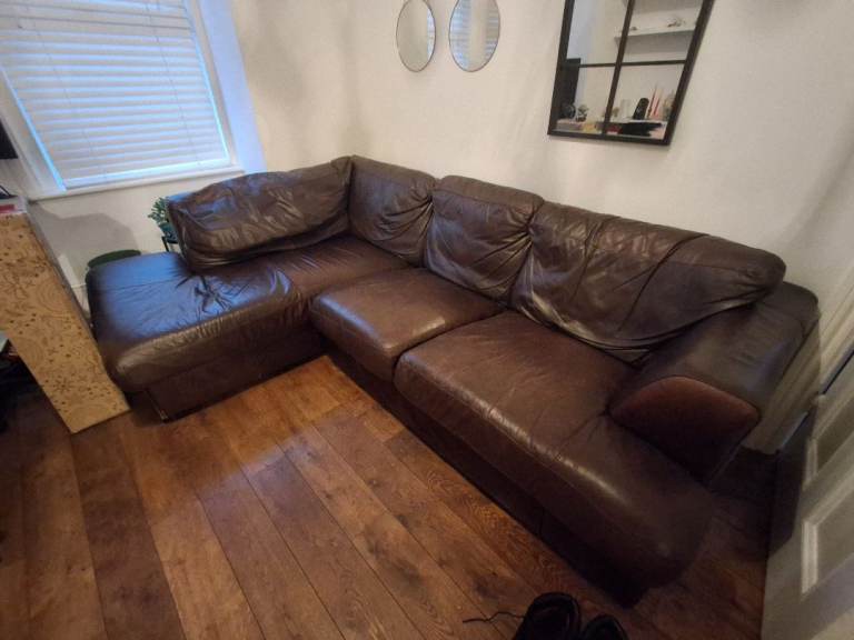 Free leather (faux leather I think) sofa to collect