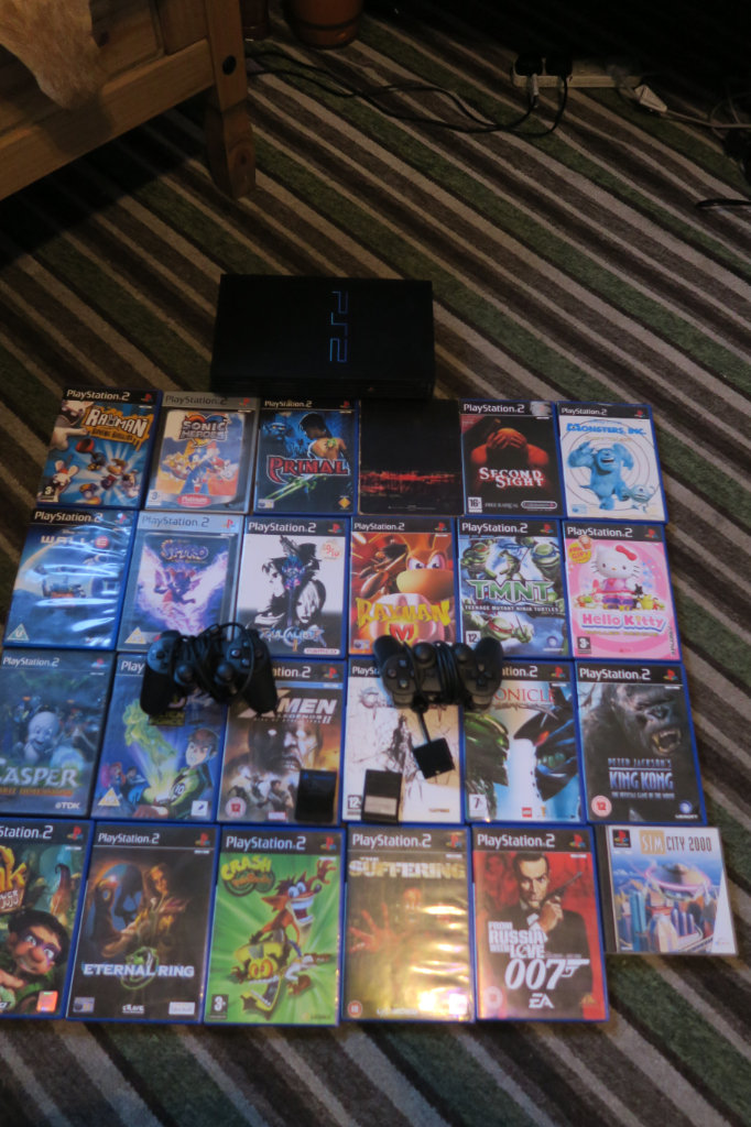 PS 2. 24 GAMES..  2 JOYPADS .2 MEMORY CARDS 