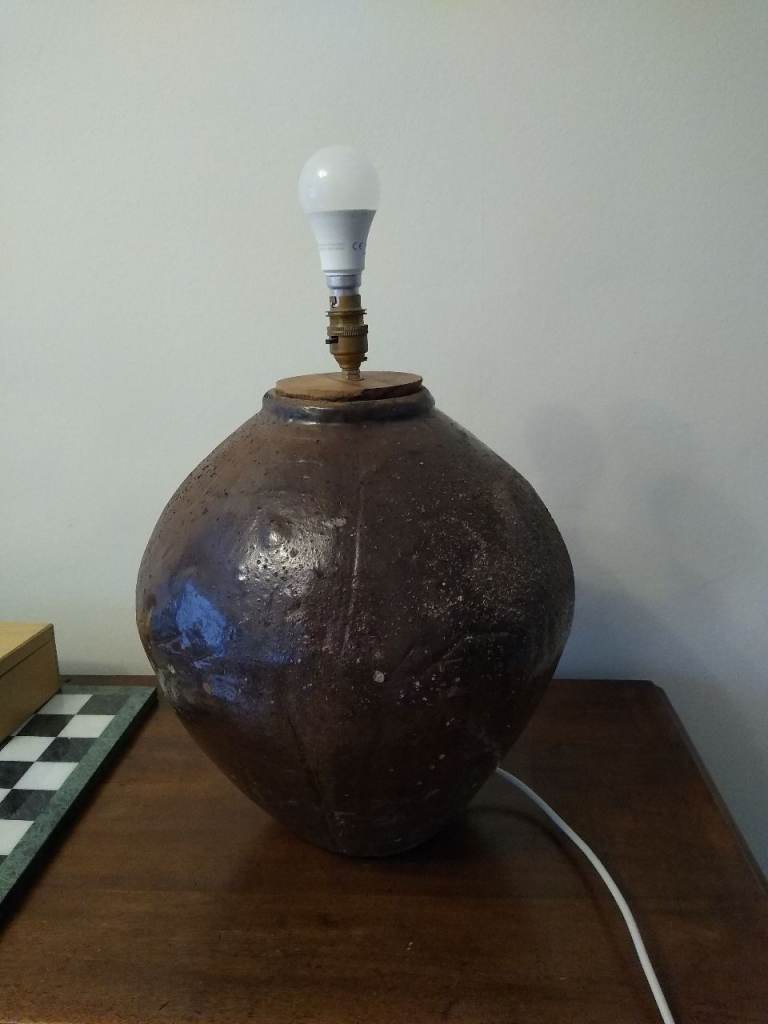 Large rustic table lamp.